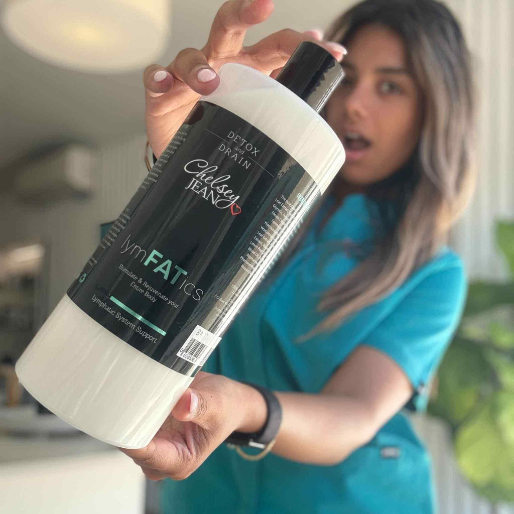 Person holding a 1L lymphatic cream