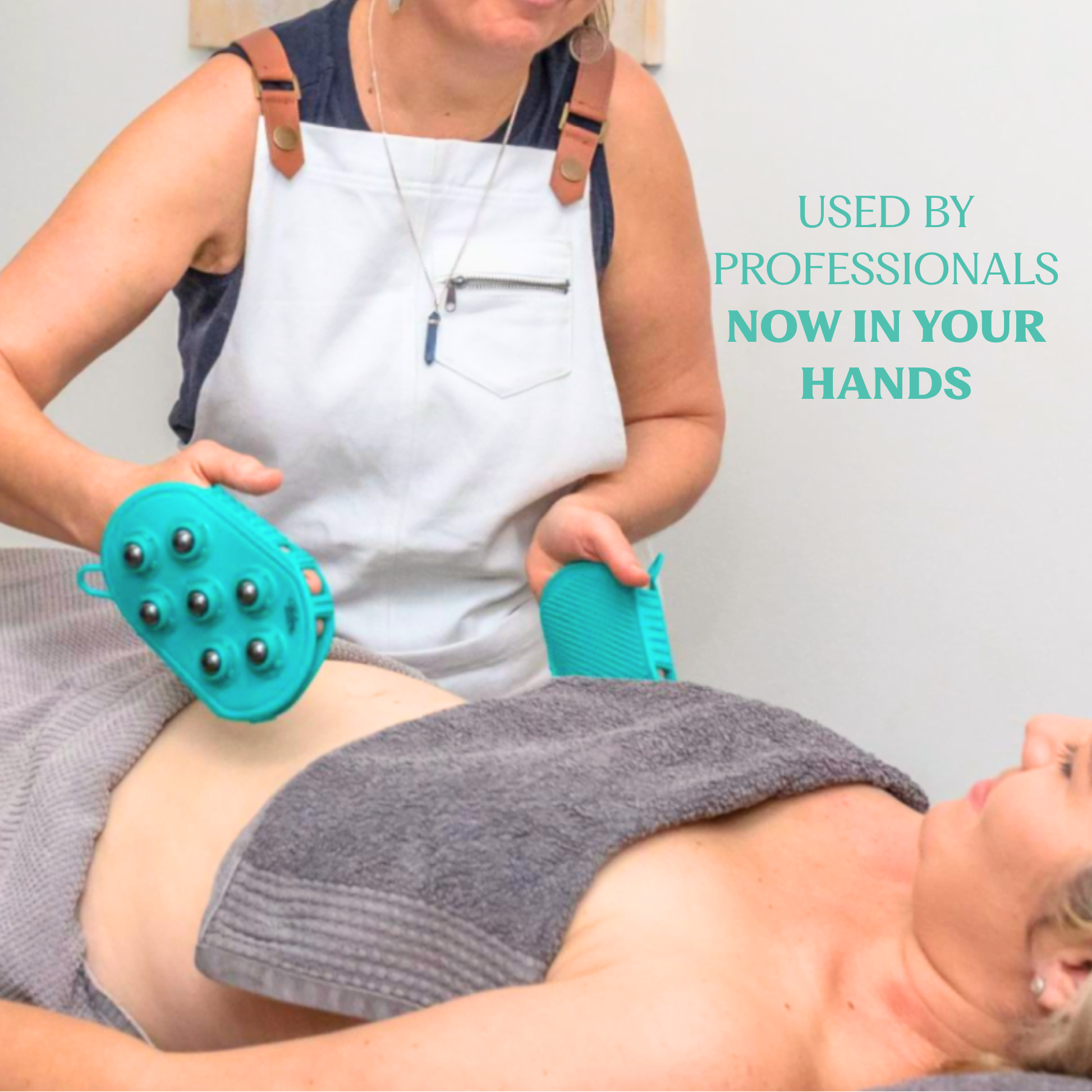 Person receiving a massage with a handheld device, used by professionals now available.
