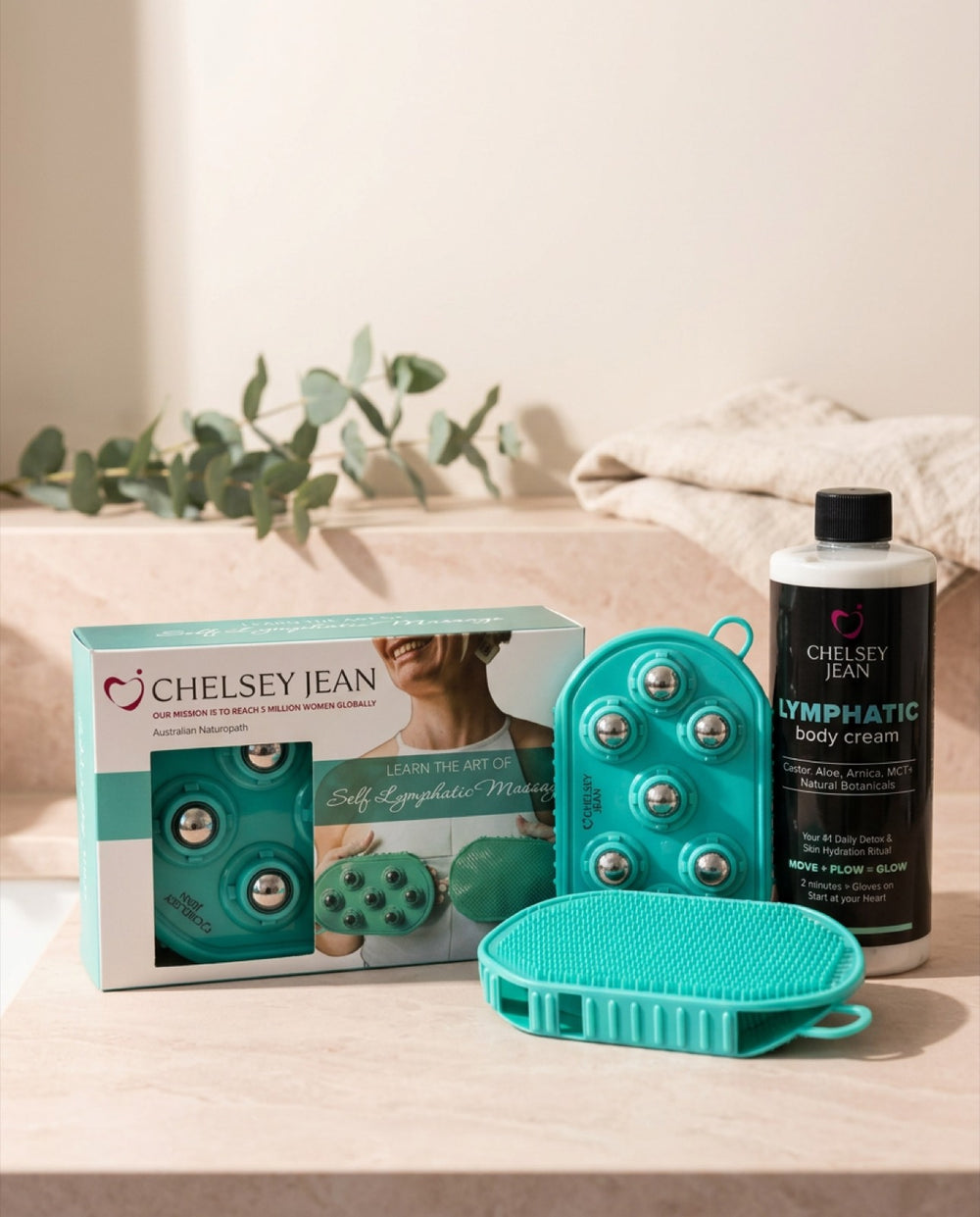 The Dual-Action Lymphatic Gloves, the box and the 500ml Lymphatic Cream on a bathroom counter